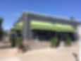 green with black stripe awning