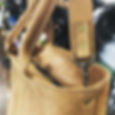 Repaired tan suede bag