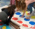 children playing on a big sheet