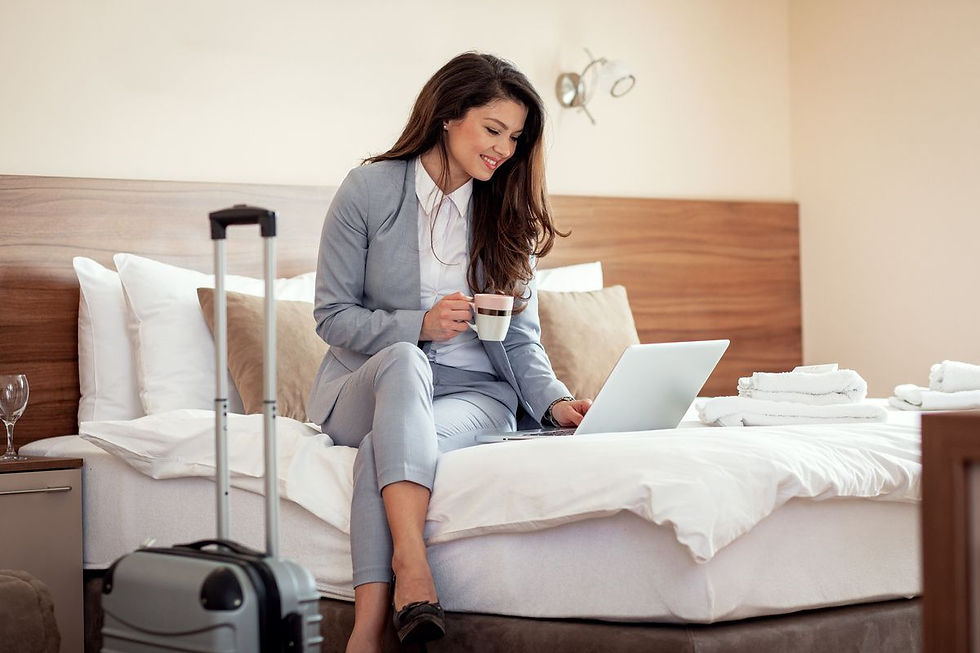 Businesswoman working from Hotel room