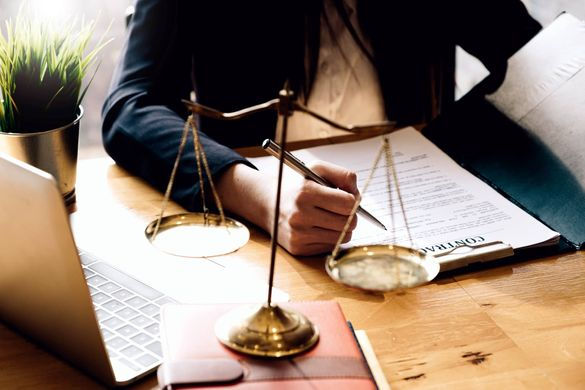 Judge gavel with Justice lawyers, Business woam in suit or lawyer working on a documents.