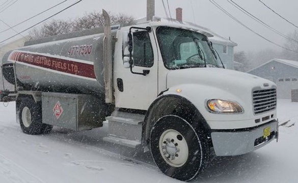 A side view of a fuel delivery truck