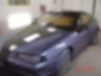 working on black car