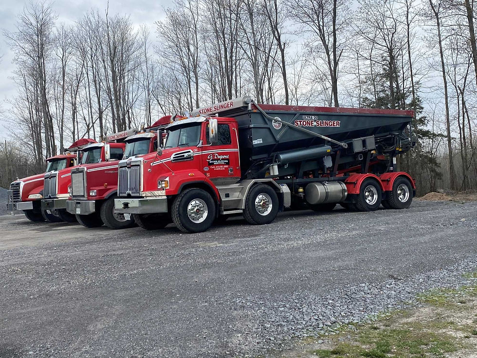 side view of G Dupont Stone Slinger Service vehicles