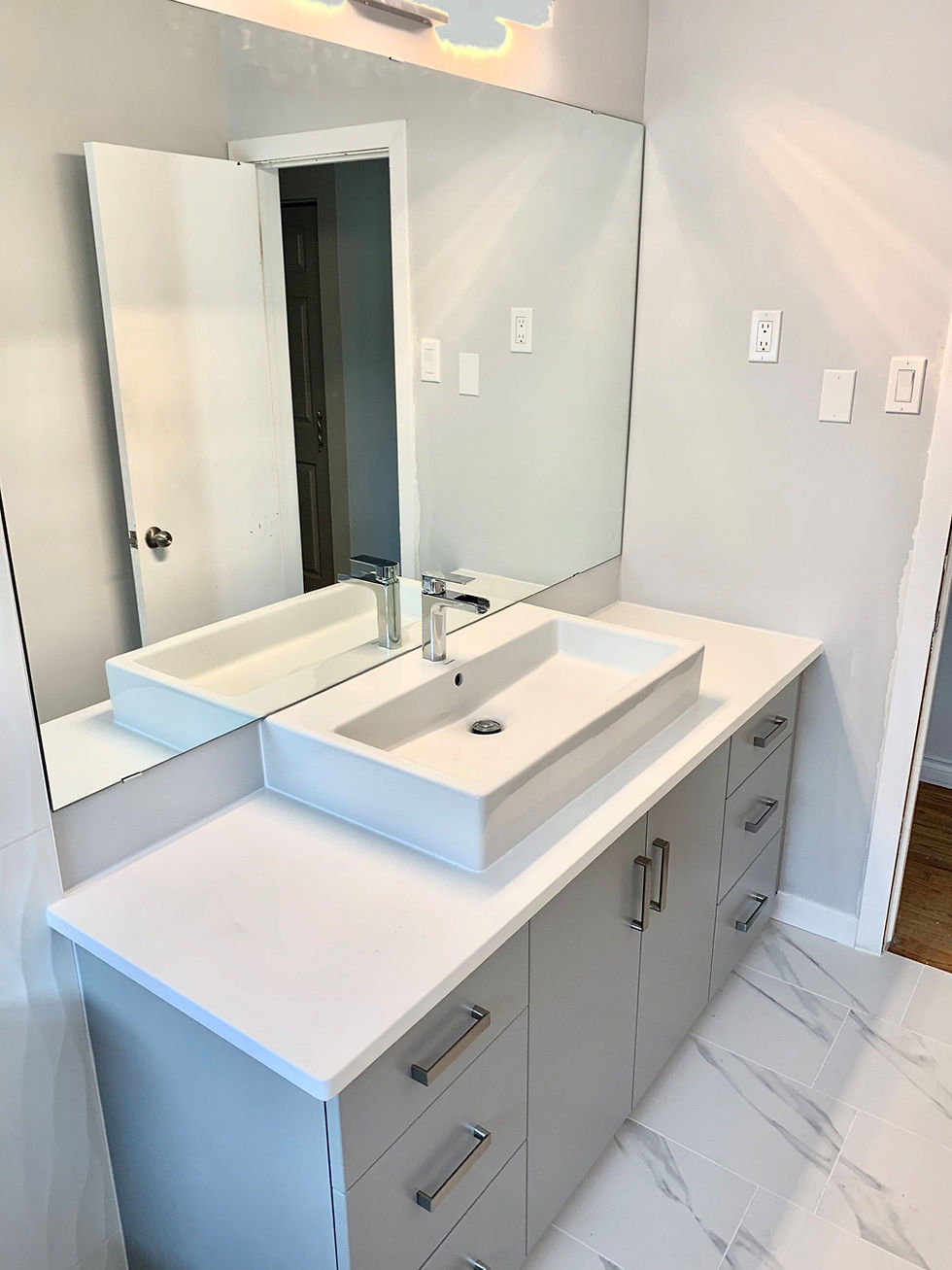 White bathroom cabinets with granite counter, sink, faucet