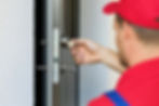 Locksmith testing a door lock