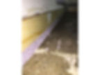 granules on the corner of the floor