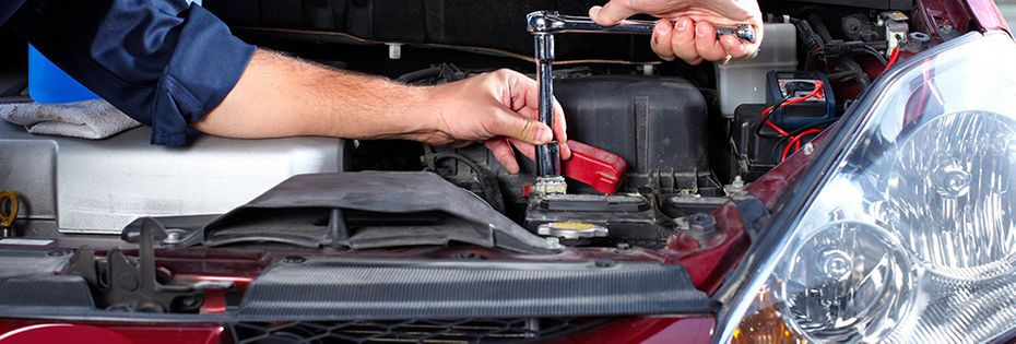 Mechanic fixing car