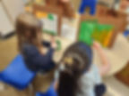 An image of kids doing painting