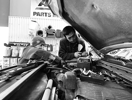 Richard working in repair shop