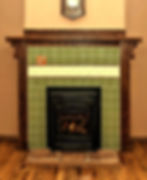 Black fireplace with a green boundary