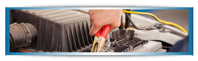 Mechanic working under car