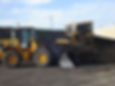 two yellow construction bobcats