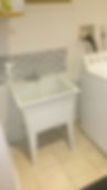 white sink with a faucet