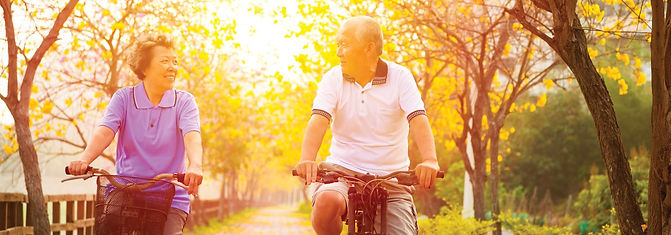 Senior couple biking