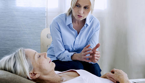 An old lady explaining to another lady