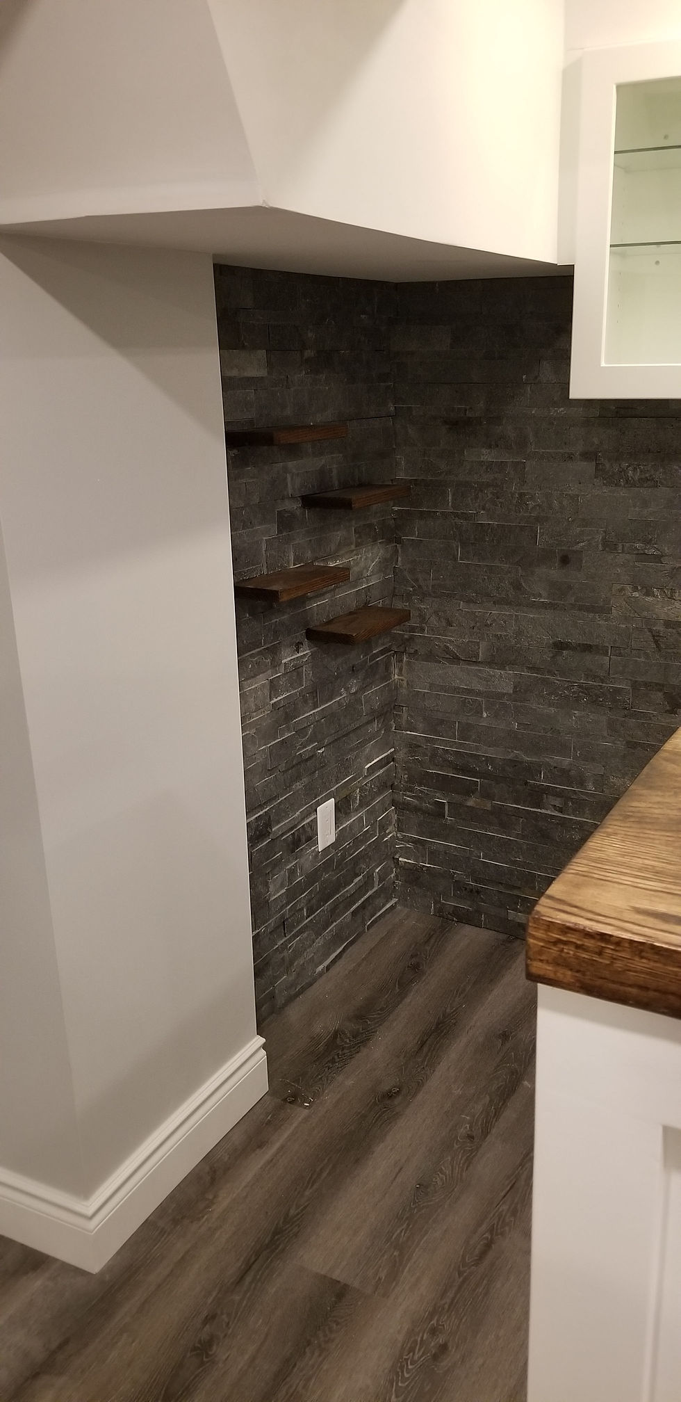 view of a room corner with installed tiles