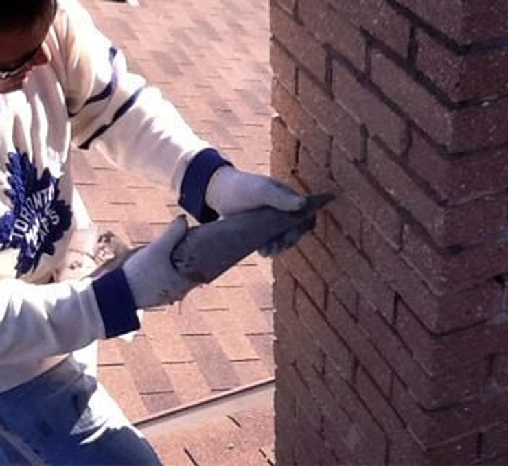 jimmy tuckpointing a chimney