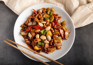 Top view of a stir fried non-veg entrée with mixed vegetables