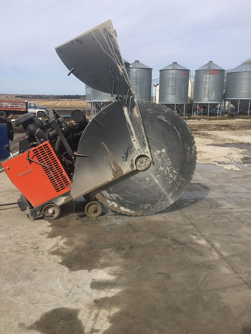 Slab saw cutting concrete