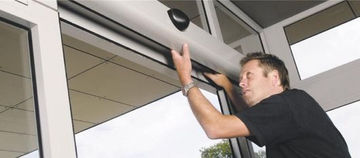 Man checking the door machine