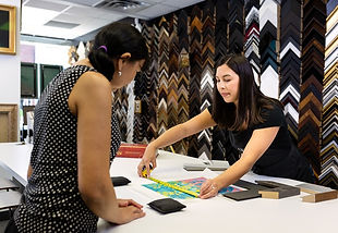 view of a team member explaining design to a customer