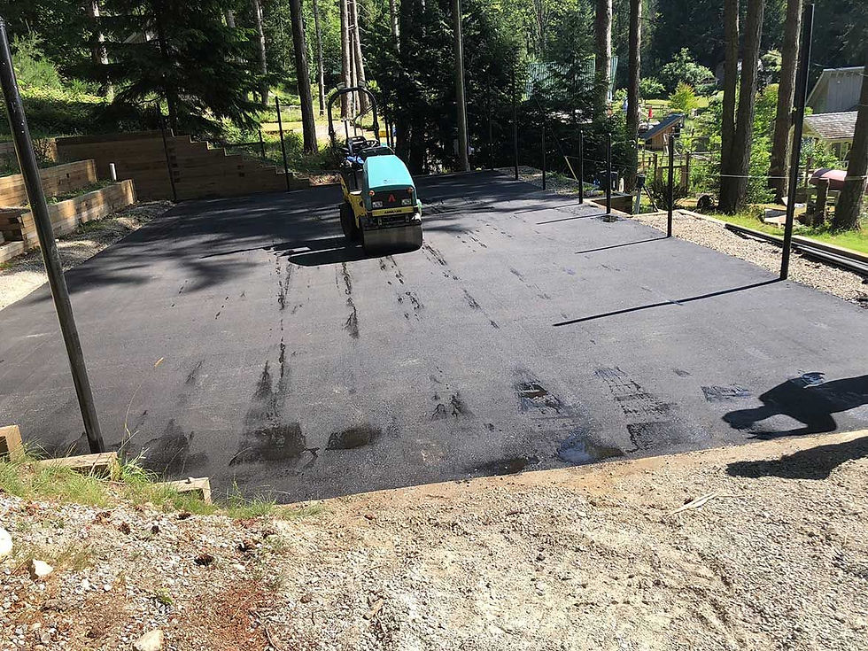 mini road roller working on asphalt road