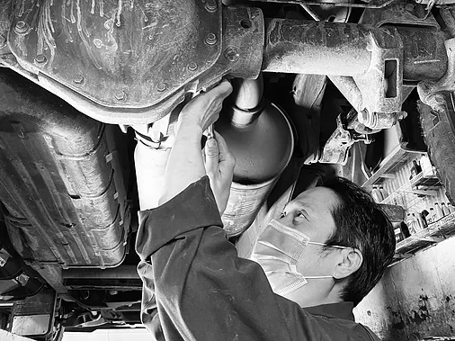 Eric working in repair shop