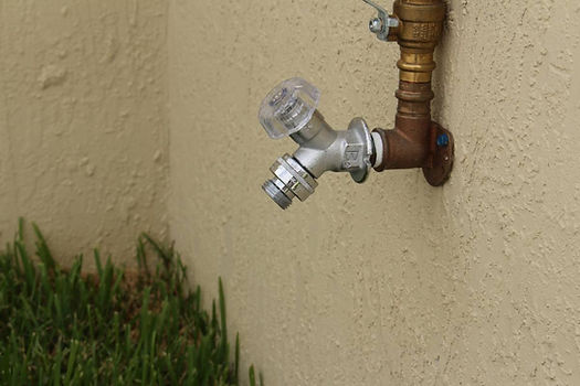 closup view of a hose bib installed outside of home