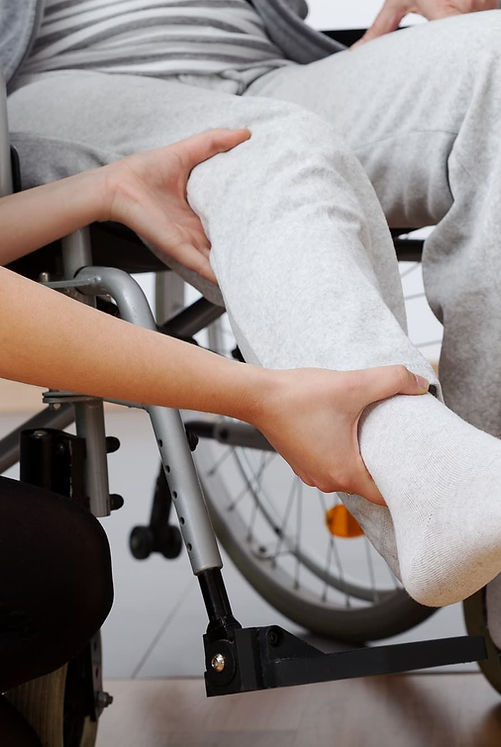 doctor treating a man's leg