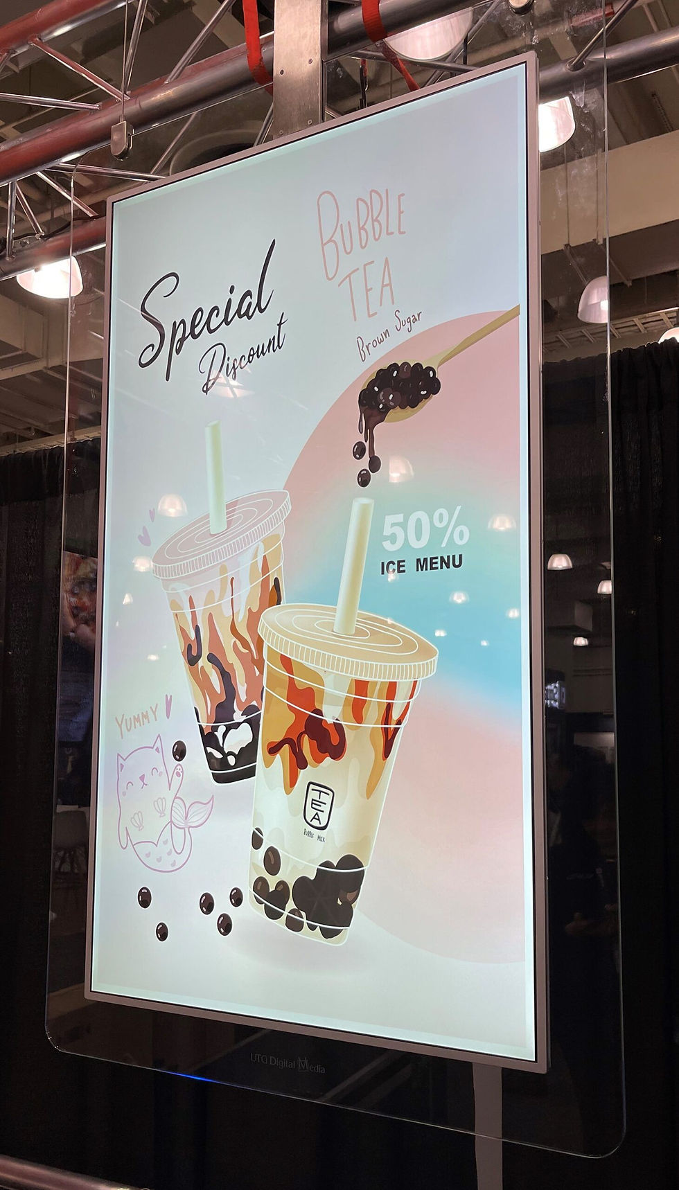 An ultra-thin display in a commercial space