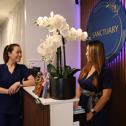 Sanctuary staff chatting at our Auckland spa