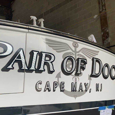 custom boat lettering, boat lettering, transom wrap, woodgrain boat wrap, transom art, boat decals, quality lettering, lettering