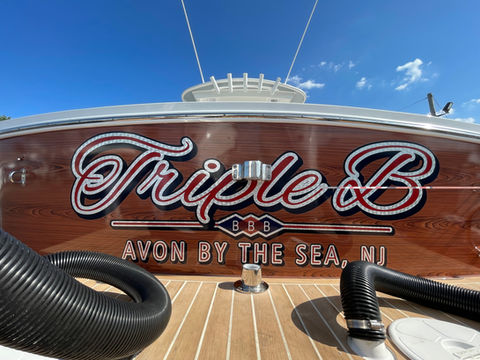 boat lettering, custom boat lettering, boat decals, vinyl lettering, vinyl letters, custom, transom art, gold leaf, quality lettering, lettering, boat wraps, silver leaf, boat art, nunn and son, faux teak woodgrain wrap, faux teak