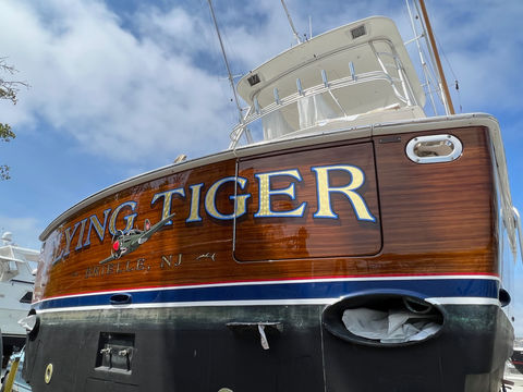 custom boat lettering, faux teak transom woodgrain wrap gold leaf boat lettering