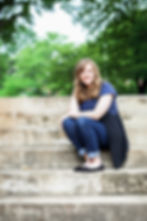 High school senior portrait session in natural outdoor setting