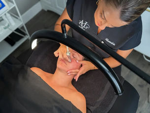 woman getting facial at lux spa