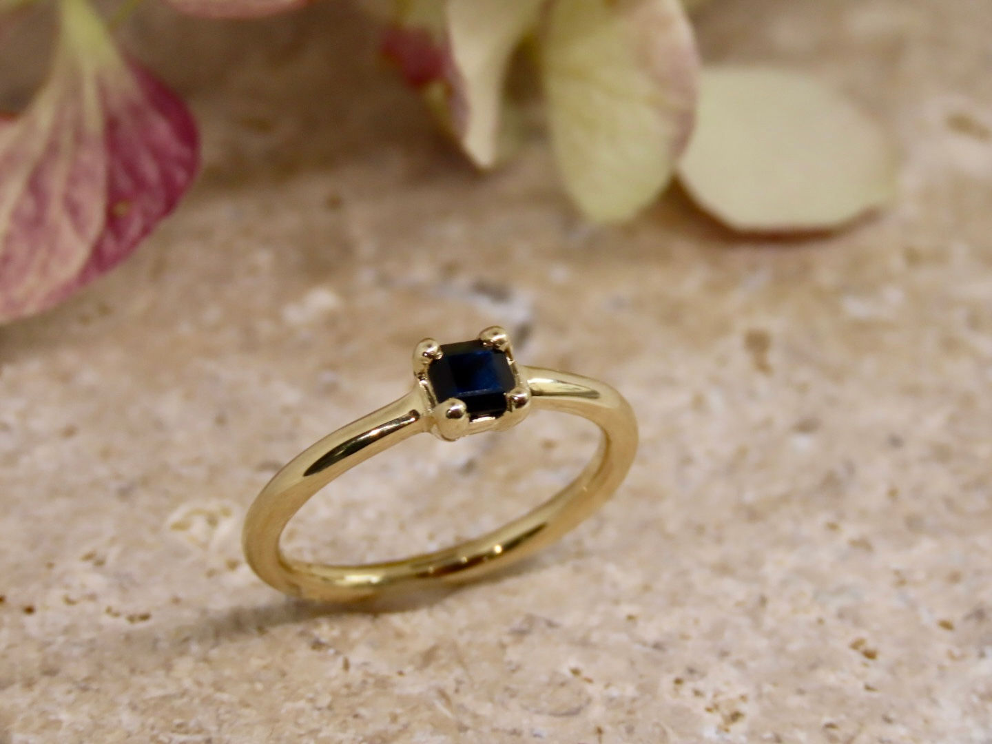 Princess cut blue sapphire engagement ring