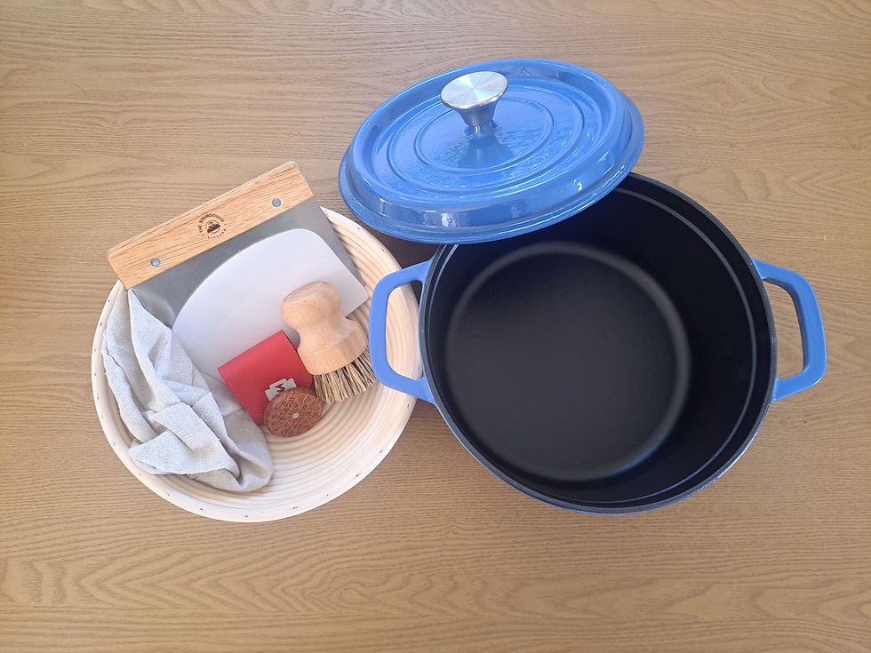 Thumbnail: Essential sourdough baking kit featuring a blue enamel Dutch oven, rattan banneton, monkey lame, and a natural fibre cleaning