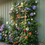 Thumbnail: Wooden garden trellis mounted on fence with roses and flowering vines