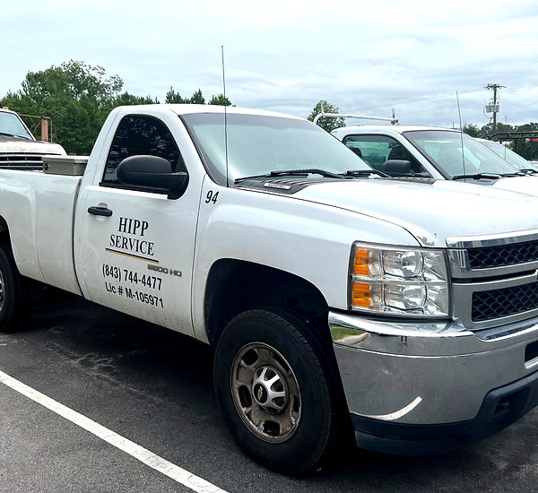 HVAC technician repairing air conditioning unit in Colleton County, SC