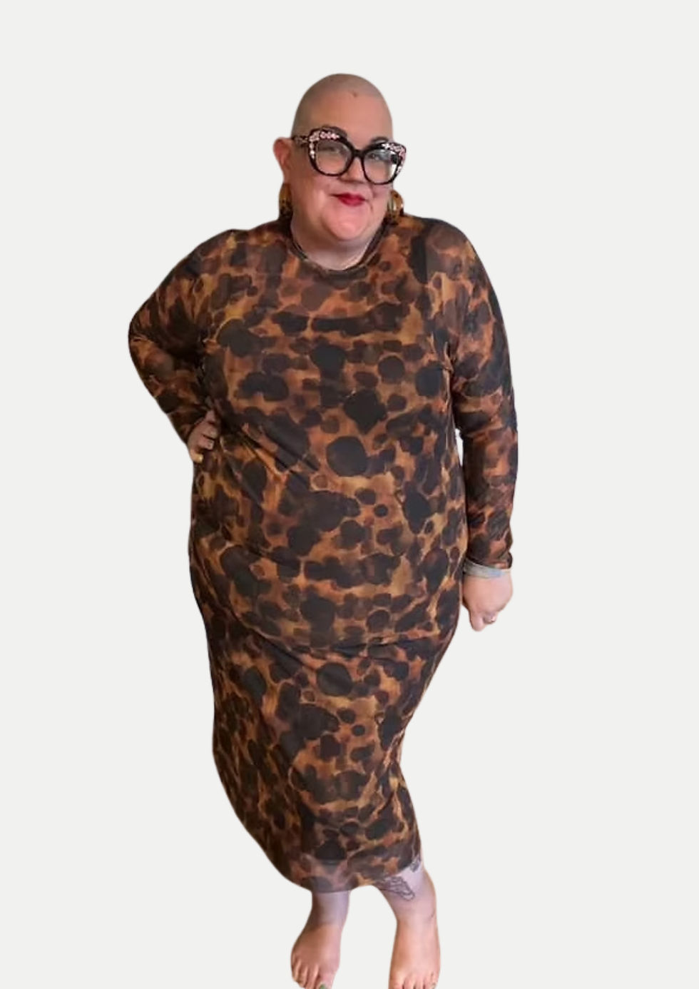 Thumbnail: plus size model wearing a long mesh animal print dress with sleeves