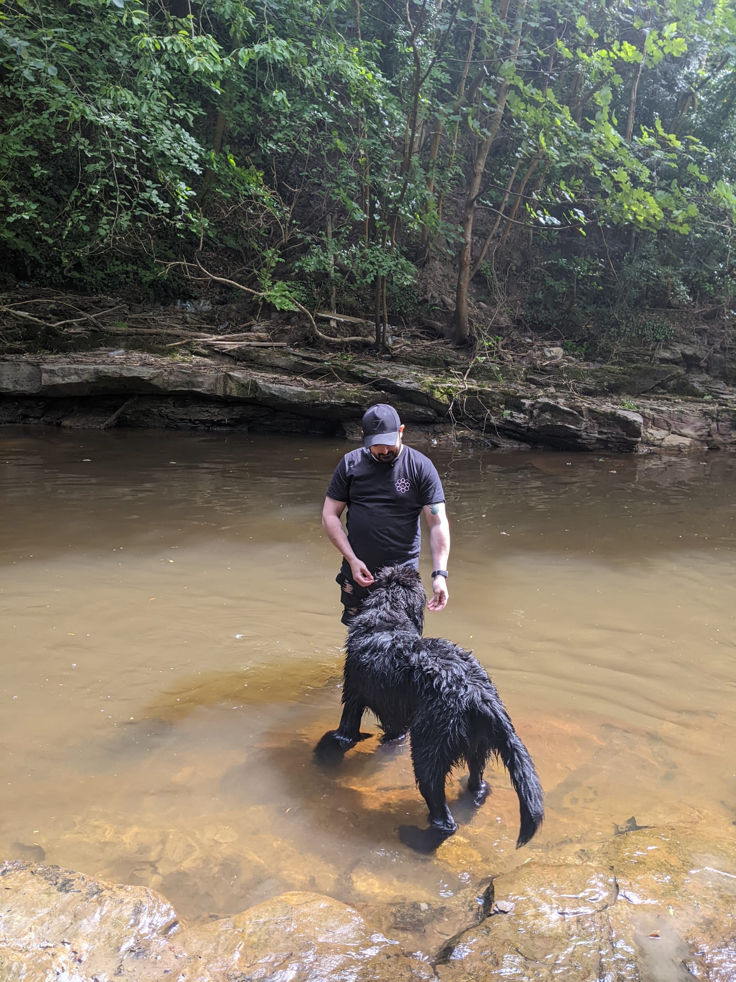 Rich training a Newfoundland in a Scottish river