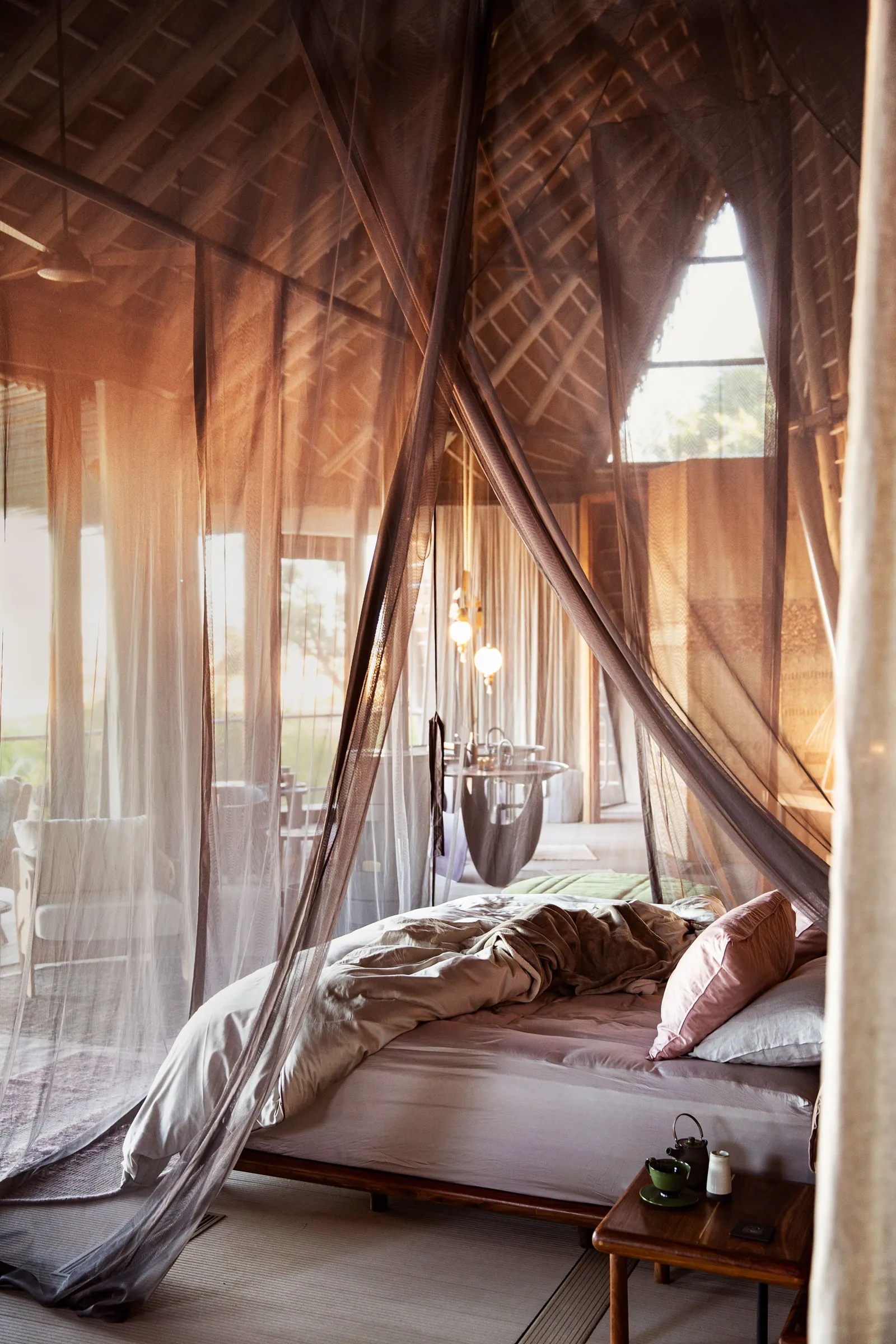 A cosy bed of a hotel with corona