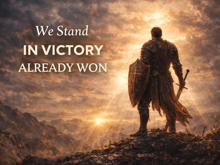 A battle-worn warrior standing on a mountain at sunrise, symbolizing standing in the victory already won through Jesus Christ.