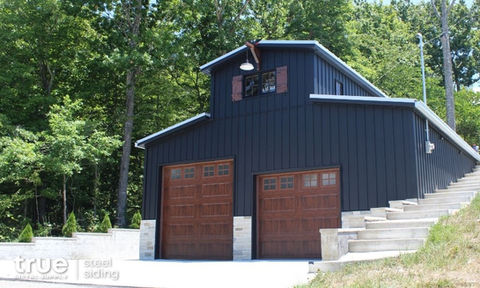Textured Black Board & Batten steel siding with a Galvalume TrueLock 175 metal roof.