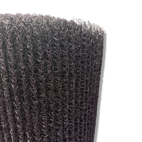 Close-up view of Dry-Tech Entangled Mesh, showing its three-dimensional, woven polymer matrix