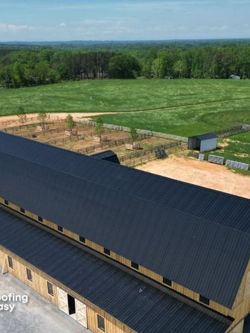 Cattle Barn with Black Metal Roof