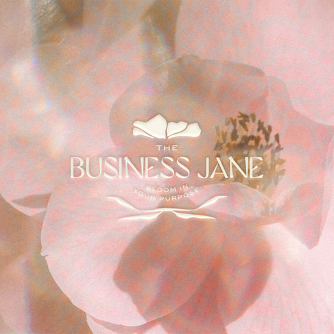 Feminine brand identity with floral logo design for The Business Jane