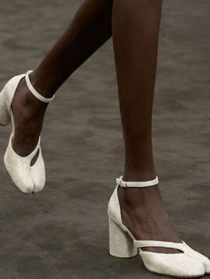 WHY UGLY SHOES DOMINATE LUXURY FASHION. What Valentino’s pumps, Margiela’s Tabi, Balenciaga’s Triple S, and Loewe’s surrealist designs have in common.